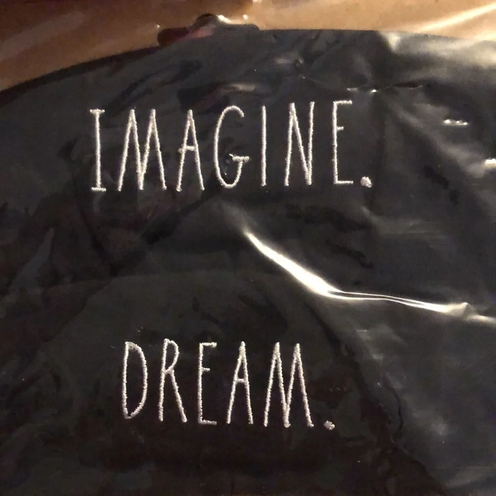 Rae Dunn Black Reusable Face Masks one says Imagine the other says Dream